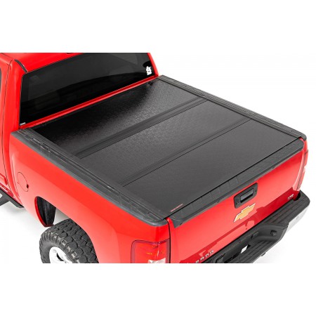 GM Low Profile Hard Tri-Fold Tonneau Cover (07-13 1500 | 5.5' Bed W/ Rail Caps)